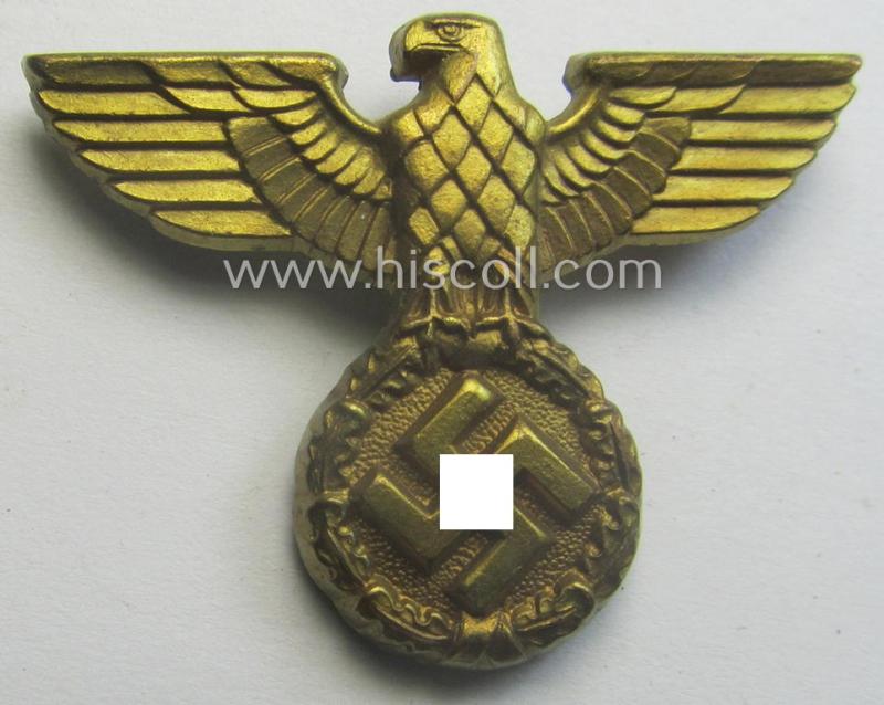 Bright-golden-toned- (and zinc- ie. 'Feinzink'-based) smaller-sized, political-style visor- (ie. 'Schirmmützen' cap-eagle being a detailed example that shows an: 'A' (ie. 'Assmann & Sohne'-) makers'-designation
