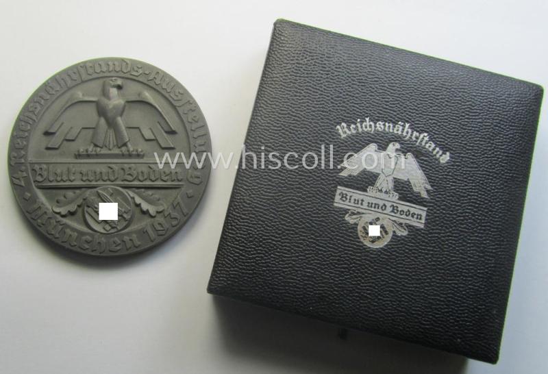 Greyish-silver-toned, 'Reichsnährstand'- (ie. 'RNSt.'-) related, commemorative-award-plaque entitled: '4. Reichsnährstands-Austellung - Blut und Boden - München 1937 - ungesalzene Butter' and that comes stored in its period etui