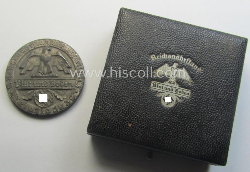 Greyish-silver-toned, 'Reichsnährstand'- (ie. 'RNSt.'-) related, commemorative-award-plaque entitled: '5. Reichsnährstands-Austellung - Blut und Boden - Leipzig 1939 - Rohmilch' and that comes stored in its period etui