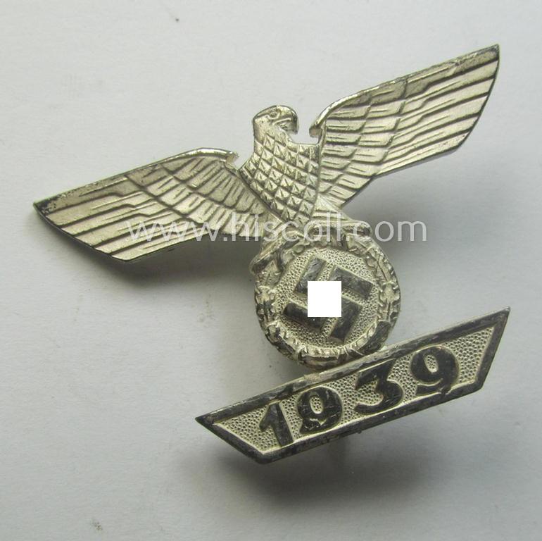 'Wiederholungsspange zum EK I.Kl.' (or: bar to the WWI IC 1st class) being a typical, maker- (ie. 'L/11'-) marked example as was produced by the maker (ie. 'Hersteller') named: 'Wilh. Deumer'