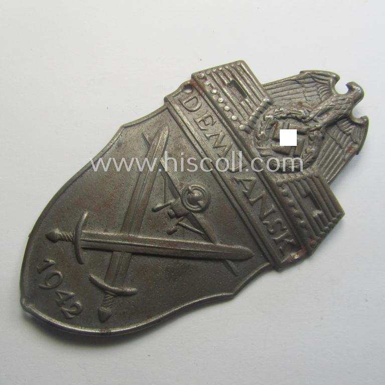 Nicely preserved - albeit regrettably incomplete ie. relic! - example of a WH (Heeres ie. Waffen-SS) 'Demjansk'-campaign-shield as executed in typical magnetic, so-called: 'Eisenblech'