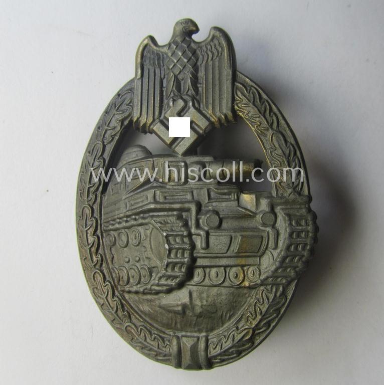 'Panzerkampfabzeichen in Bronze' (or: bronze-class panzer assault-badge or PAB) being a neat (I deem) somewhat later-war-period zinc- (ie. 'Feinzink'-) version as was procuced by the: 'Frank u. Reif'-company