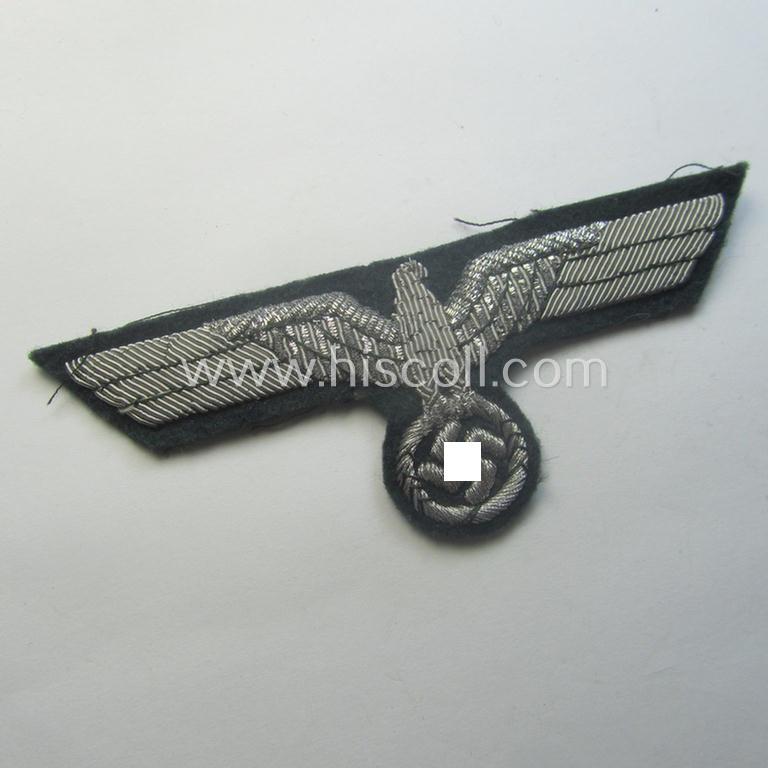 WH (Heeres) officers'-type, hand-embroidered breast-eagle (ie. 'Brustadler für Offiziere') as was executed in bright-silverish-coloured braid as was intended for usage on the various officers'-pattern tunics