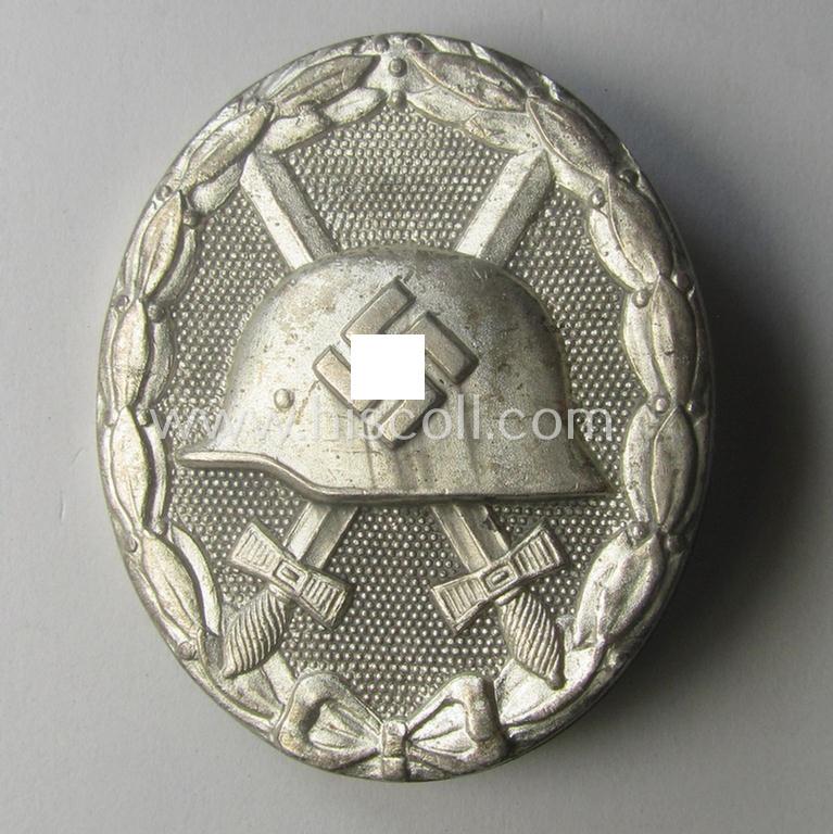 'Verwundeten-Abzeichen in Silber' being a clearly maker- (ie. '26'-) marked- and typical zinc- (ie. 'Feinzink'-) based example as was produced by the desirable maker: 'B.H. Mayer's Kunstprägeanstalt'