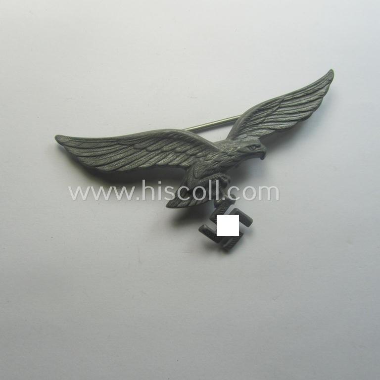 WH (Luftwaffe) zinc- (ie. 'Feinzink'-) based breast-eagle as was specifically intended for usage on the white summer-tunics (ie. 'Brustadler für Sommerrock') being a detailed- and maker- (ie. 'A'-) marked specimen