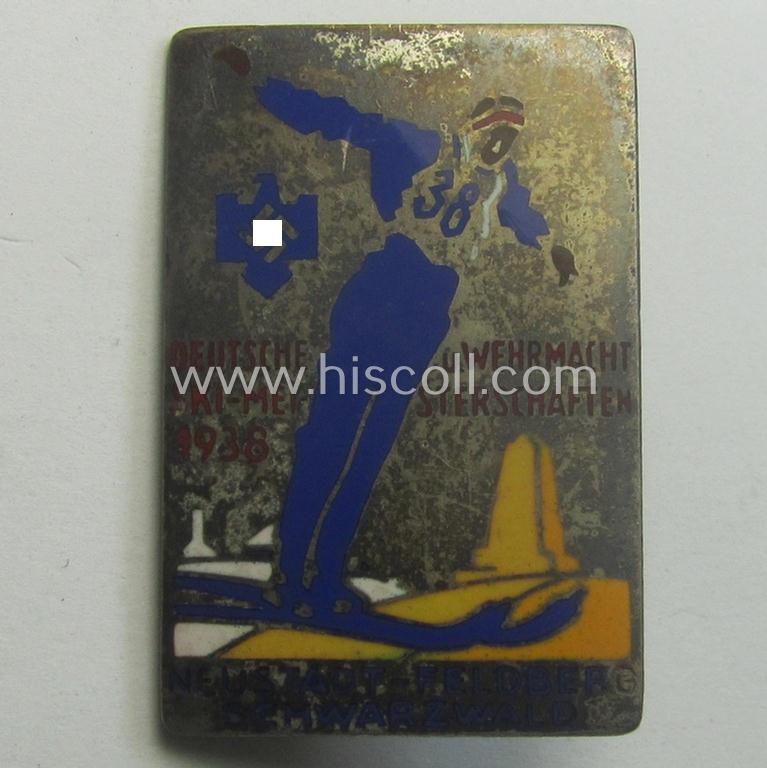 Semi-enamelled- and silver-toned 'N.S.R.L.'-related day-badge (ie. 'tinnie' or: 'Veranstaltungsabzeichen') as was issued to commemorate participation within the: 'Deutsche u. Wehrmacht Ski-meisterschaften 1938'